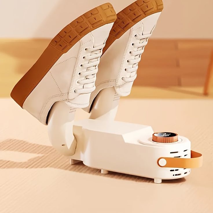 Electric shoe dryer with a timer and temperature control.